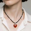 Black Beaded Necklace with Red Jasper Heart – Handmade Minimalist Jewelry – Sirius