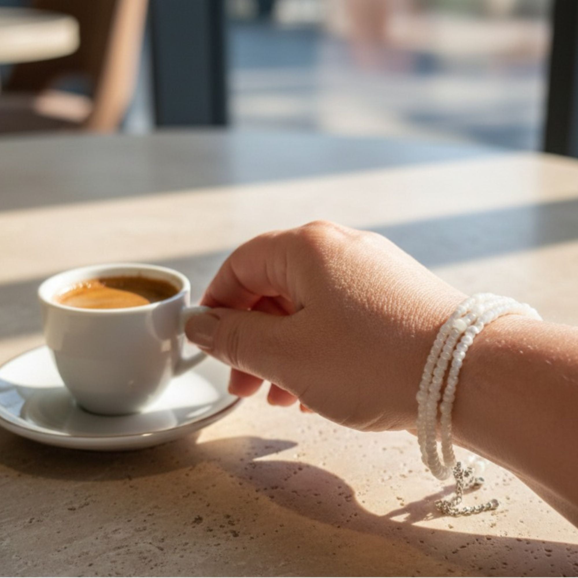 Three-Strand Pearl Bracelet in Soft Cream White – Elara